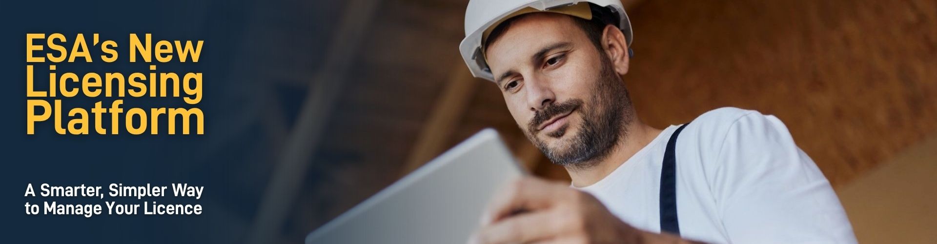 contractor looking at a white tablet  with texts 